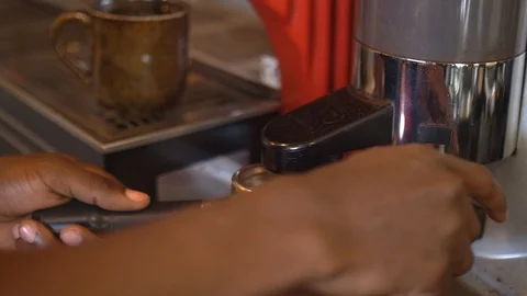 4K extreme close up view of hands making espresso. 스톡 동영상 111339377