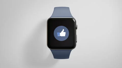 4k - facebook like icon on smart watch Stock Footage 62535511