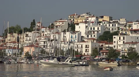 4K Famous crowded old town Skiathos Island yacht boat anchor marine vessel day   Stock Footage 61656524