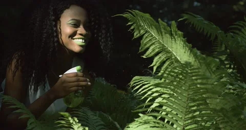 4k. Fast and slow motion. Household routine. Exotic nature. Afro American woman Stock Footage 160930589