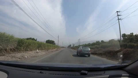 4k fast camera point of view of a car camera on a road between mountains  Stock Footage 144351704