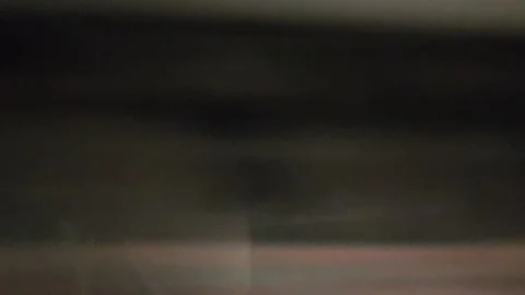 4K, Fast moving train rushes through tunnel Stock Footage 123872162