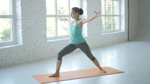 4K, Female Doing Stretching Workout On Exercise Mat At White Fitness Class Stock Footage 95498101