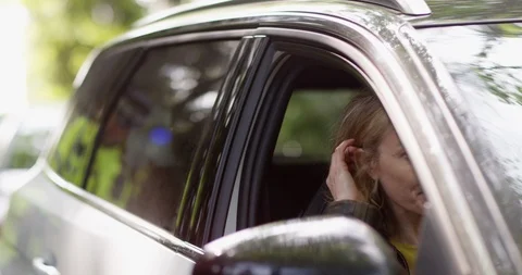 4K Female driver trying to make excuses to policeman for traffic violation Stock Footage 113157346