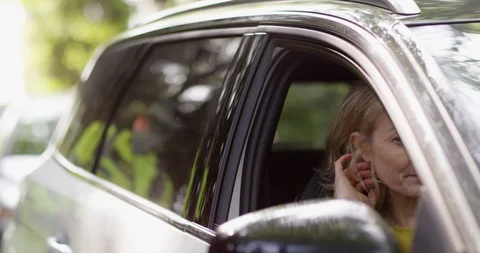 4K Female driver trying to make excuses to policeman for traffic violation Stock Footage 113719478