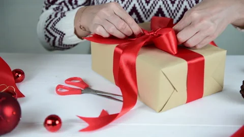4k Female hands making gift box for Christmas and New Year Stock Footage 144932653