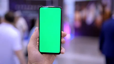 4k Female hands using mobile phone with green screen. Chroma key. Mobile app on Stock Footage 249257133