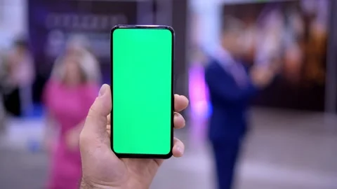4k Female hands using mobile phone with green screen. Chroma key. Mobile app on Stock Footage 250099472