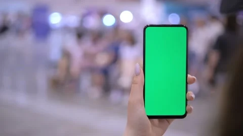 4k Female hands using mobile phone with green screen. Chroma key. Mobile app on Stock Footage 277216709