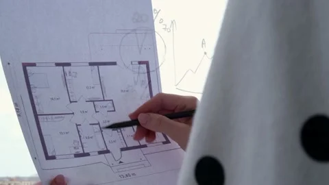 4k Female interior designer drawing house plan in office. Workplace Workspace Stock Footage 153066495