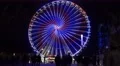 4k Ferris Wheel with blue illumination at Christmas fair 4k or 4k+ Resolution