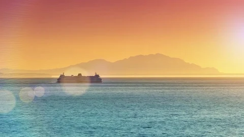 4K Ferry Boat on Open Ocean, Orange Sky Sunset, Blue Water BC Ferry Stock Footage 79729214