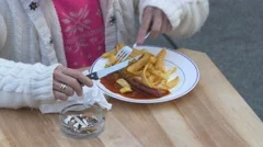 https://images.pond5.com/4k-fhd-woman-eats-sausage-footage-044353155_iconm.jpeg