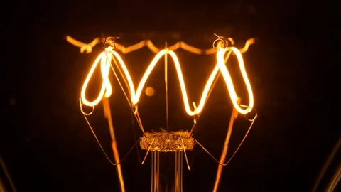 4K - Filament of a light bulb Stock Footage 125432377