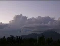 4K Film 24p Thunderhead clouds leave quickly at sunset over the mountains 4k or 4k+ Resolution