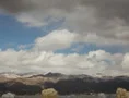 4K Film format - The end of a winter storm passes over snow capped mountains 4k or 4k+ Resolution