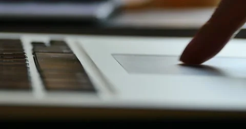 4k Finger operating touch pad,computer notebook laptop keyboard input closeup. Stock Footage 40436396
