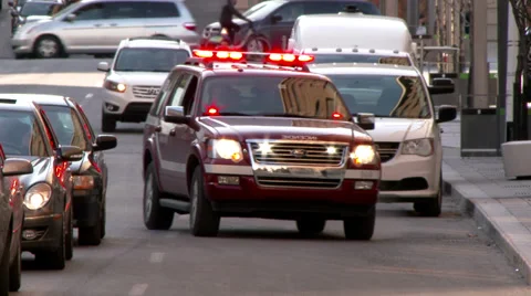 4K - Fire chief vehicle passing fast with lights and sirens Stock Footage 39430752