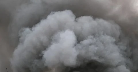 4K Fire Thick Smoke Billowing From Burning Firepit Plane Crash Pan Up 스톡 동영상 307128129