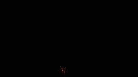 4K fireworks display shot in slowmotion, against a cloudless black night sky. Video stock 142293326