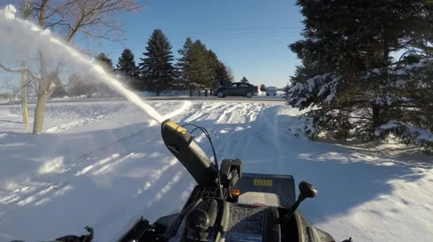 4k first person view of snowblowing snow Stock Footage 46607589