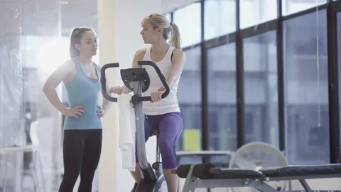 4K Fit group working out in the gym, video screen showing moving outdoor scene Stock Footage 75873662