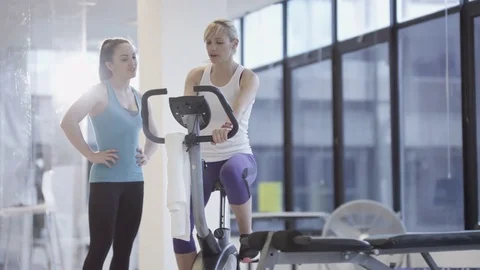 4K Fit group working out in the gym, video screen showing moving outdoor scene Stock Footage 75873830