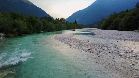 4K. Flight above Soca river in Slovenia at sunset. Soca Valley, Bovec district. Video stock 78500594