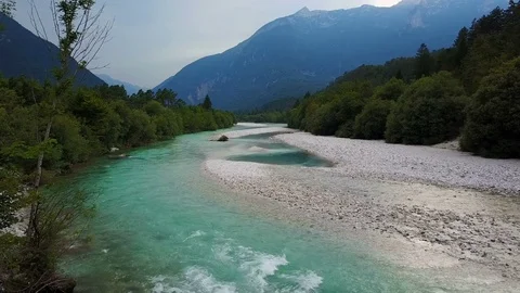 4K. Flight above Soca river in Slovenia at sunset. Julian Alps, Soca Valley. Video stock 78506637