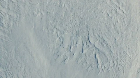 4K. Flight and takeoff above snow fields in winter, aerial view with rotation. 動画素材 59494463