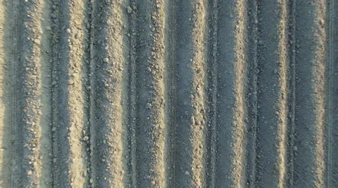 4K. Flight and takeoff above freshly cultivated fields at sunset, aerial view. 스톡 동영상 62761465