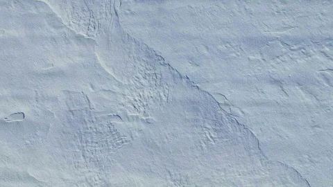 4K. Flight and takeoff above snow fields in winter, aerial view with rotation. Video stock 81522975