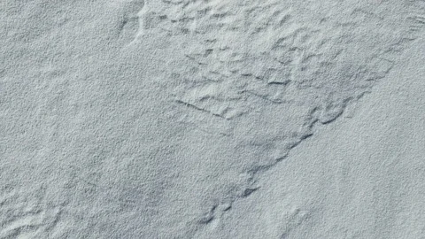 4K. Flight and takeoff above snow fields in winter, aerial view. Vídeo Stock 99374142