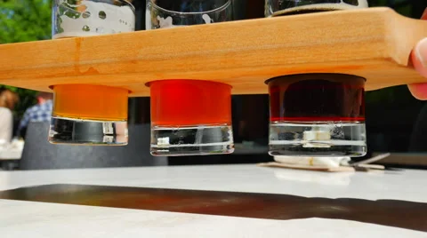 4K Flight of Craft Beer, Micro Brew Beers, Summer Patio Stock-Footage 63421146
