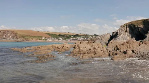 4K Flight Over Cliffs at Challisborough Beach on the South Devon Coast Stock Footage 112450668