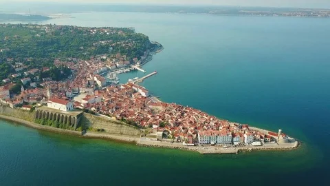 4K. Flight over old city Piran in the morning, aerial top panoramic view. Video stock 77977576