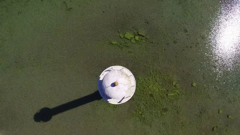 4K. Flight over old lighthouse standing in the sea, aerial view. 動画素材 72183618