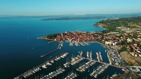 4K. Flight over old town Izola in Slovenia, aerial view with marina at sunset. Stock Footage 78042662