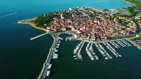 4K. Flight over old town Izola in Slovenia, aerial view with marina at sunset. Stock Footage 78043084