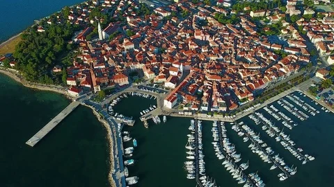 4K. Flight over old town Izola in Slovenia, aerial view with marina at sunset. Stock Footage 78043313