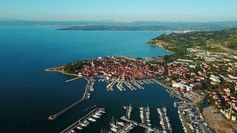 4K. Flight over old town Izola in Slovenia, aerial view with marina at sunset. Stock Footage 78043445