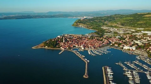 4K. Flight over old town Izola in Slovenia, aerial view with marina at sunset. Stock Footage 78043661