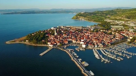 4K. Flight over old town Izola in Slovenia, aerial view with marina at sunset. Stock Footage 78044109