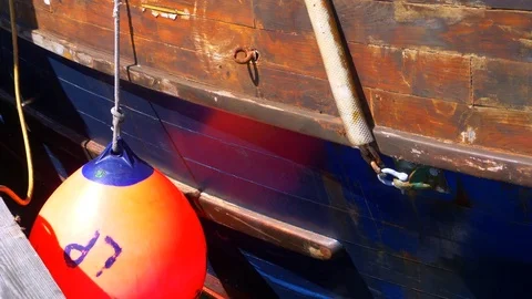 4K Floating Boat Bumper Device, Ship Marine Safety Stock Footage 78643328