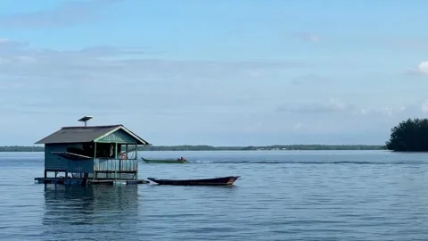 4K floating fish cage hut, floating cage huts Stock Footage 286040329