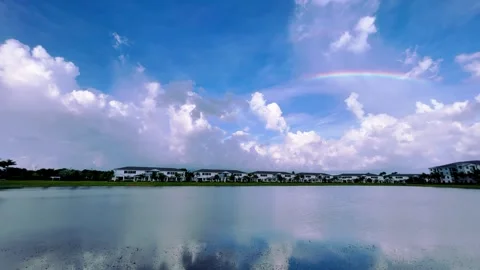 4K Florida Lake Clouds Rainbow Stock Footage 267928373