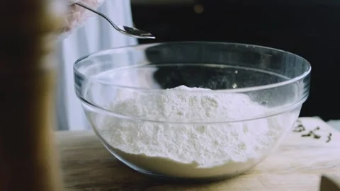 4K Flour Being Added Gradually to Wet Cookie Batter Stock Footage 342113035