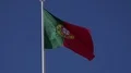 4k Fluttering Portugal flag at blue sky zoom out at Sagres castle 4k or 4k+ Resolution