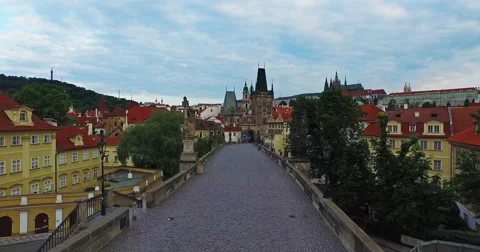 4k fly over Charles Bridge to the Bridge Tower in Prague, Czech Republic Stock Footage 61041950
