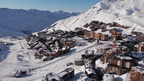 4k fly over the French ski resort of Val Thorens with a perfext blue sky Stock Footage